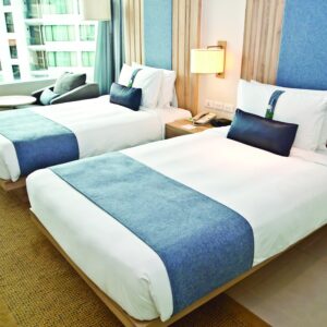 Hotel Bed Sheet White Percale T200 CottonPoly Thomaston on bed