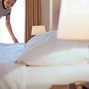 Hotel Bed Duvet Cover Sham white Sateen T310 CotPoly Satin Stripe on bed